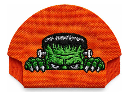 16 · Frankenstein — Orange embroidered cap-back insert; cap not included